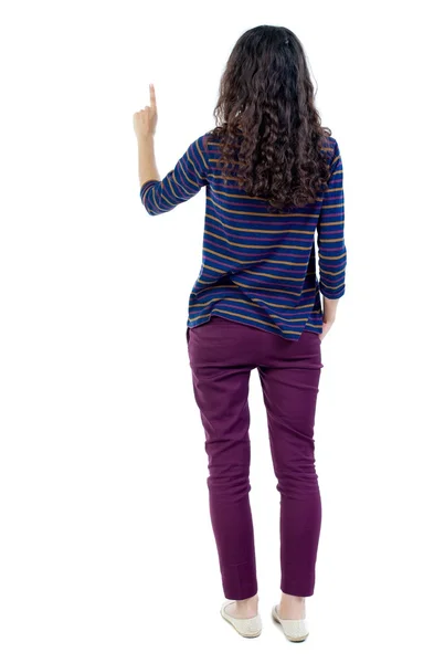 Back view of woman presses down on something. — Foto de Stock