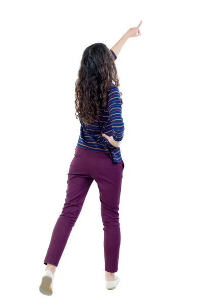 Back view of  pointing woman. beautiful girl. — Stock Photo, Image