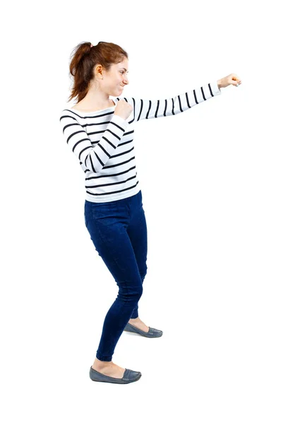 Vista posterior de peleas divertidos mujer agitando sus brazos y piernas. —  Fotos de Stock