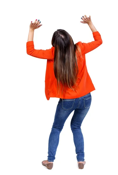 Back view of woman protects hands from what is falling — Stock Photo, Image