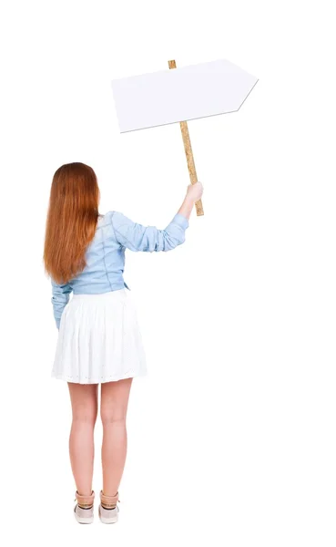 Vista posterior de mujer mostrando un tablero de la muestra. — Foto de Stock