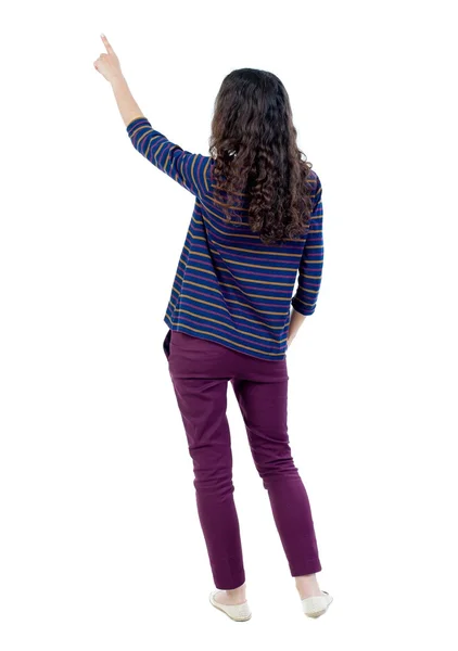 Vista posteriore della donna indicante. Bella ragazza. — Foto Stock