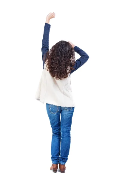 Vista posteriore di giovane bella donna di dancing. ragazza che guarda. — Foto Stock