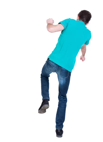 Balancing young man. or dodge the falling . — Fotografia de Stock