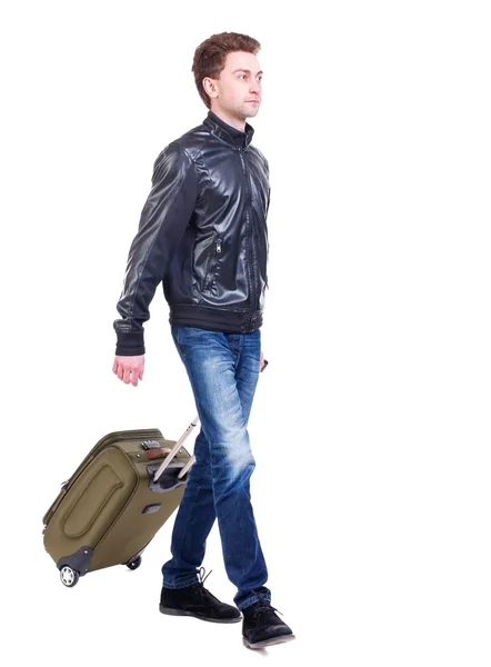 Vista frontal de caminar hombre con maleta. —  Fotos de Stock
