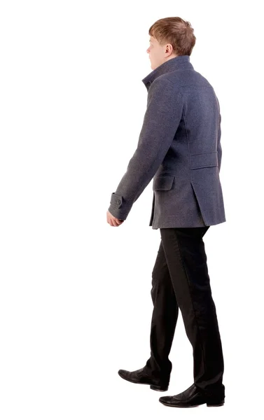 Vista di andare un uomo d'affari bel cappotto posteriore. — Foto Stock