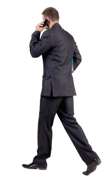 Vista posteriore di camminare uomo d'affari — Foto Stock