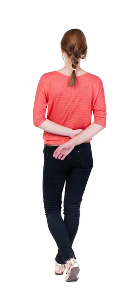 Back view of standing young beautiful  blonde woman in jeans. — Stock Photo, Image