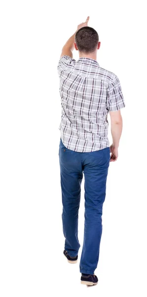 Vista trasera de un hombre guapo en jeans y una camisa . —  Fotos de Stock