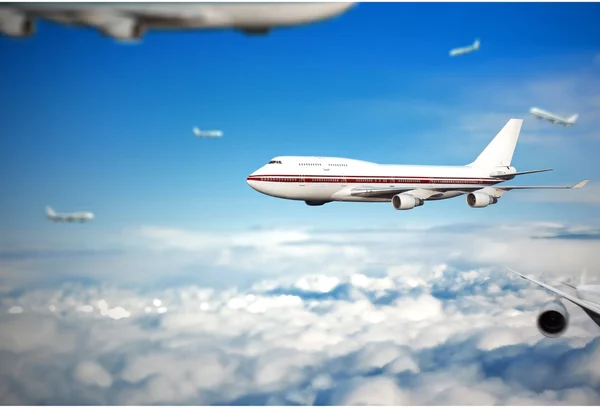 雲の中の乗客の飛行機. — ストック写真