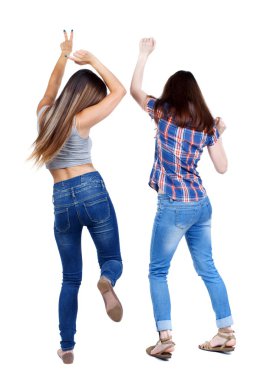 Back view of two dancing young women.