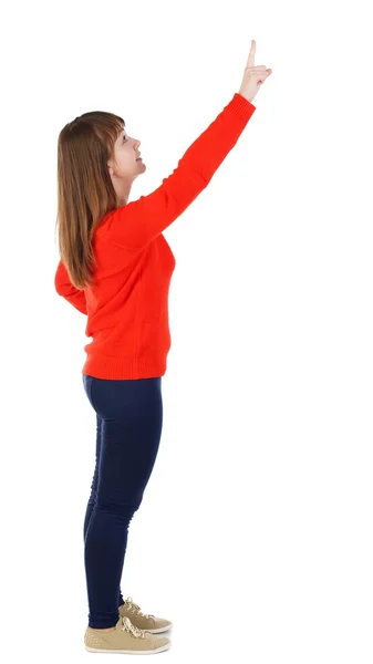 Vista posteriore della donna indicante. Bella ragazza. — Foto Stock