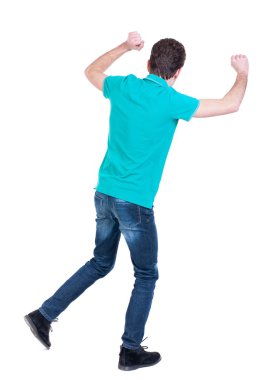 Arkadan görünüş genç adam dans.