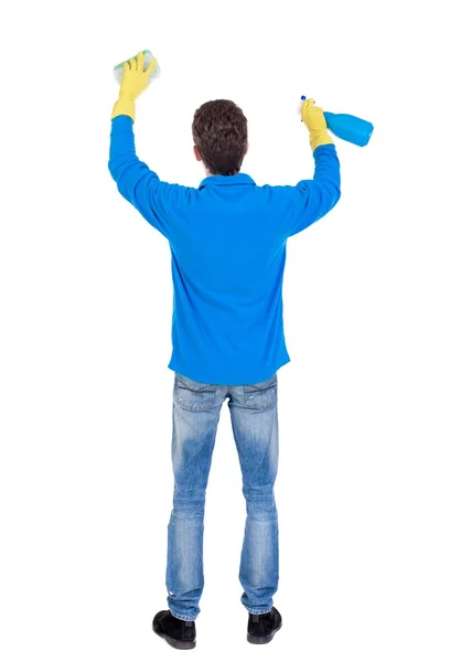 Tył widok czystsze człowieka w rękawice z gąbki i detergentów. — Zdjęcie stockowe