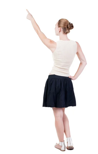 Vista posteriore della donna che punta . — Foto Stock