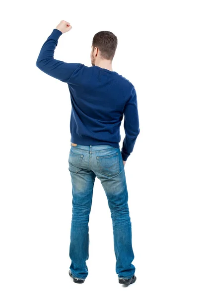 Back view of  man.  Raised his fist up in victory sign. — Stock Photo, Image
