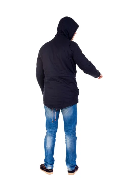 Back view of  pointing young men in parka. — Stock Photo, Image