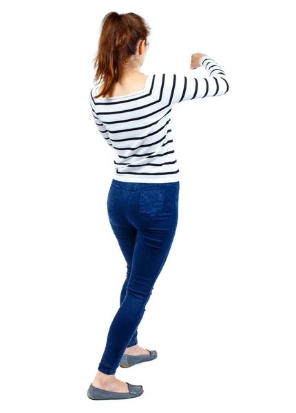 Vista posterior de peleas divertidos mujer agitando sus brazos y piernas. — Foto de Stock