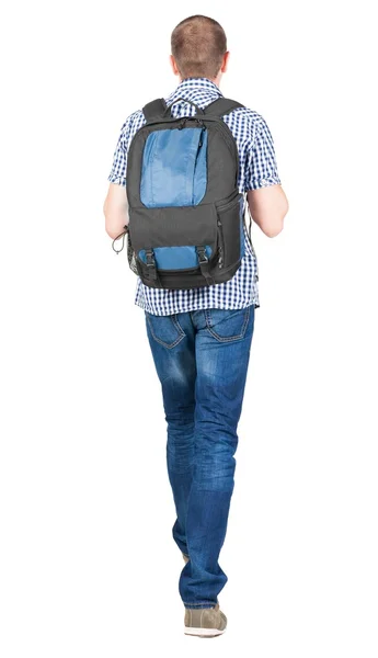 Back view of walking  man  with backpack. — Stock Photo, Image