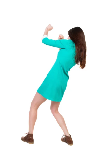 Mujer flacas gracioso combate agitando sus brazos y piernas. — Foto de Stock