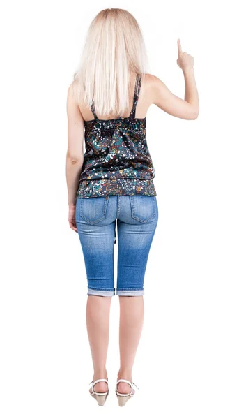 Vista posteriore della donna che punta . — Foto Stock