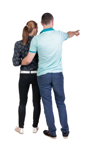 Casal jovem apontando . — Fotografia de Stock