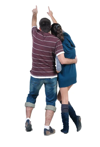 Young couple looks where that. Rear view. — Stock Photo, Image