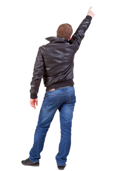 Back view of  man in jacket  pointing. — Stock Photo, Image