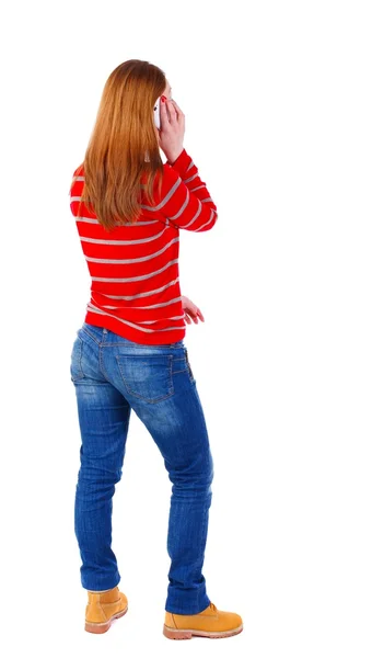 Vista posterior de una mujer hablando por teléfono. —  Fotos de Stock