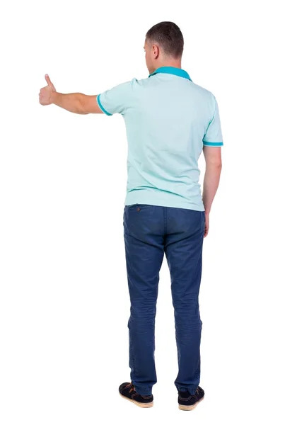 Vista traseira do homem de camisa quadriculada mostra polegares. — Fotografia de Stock