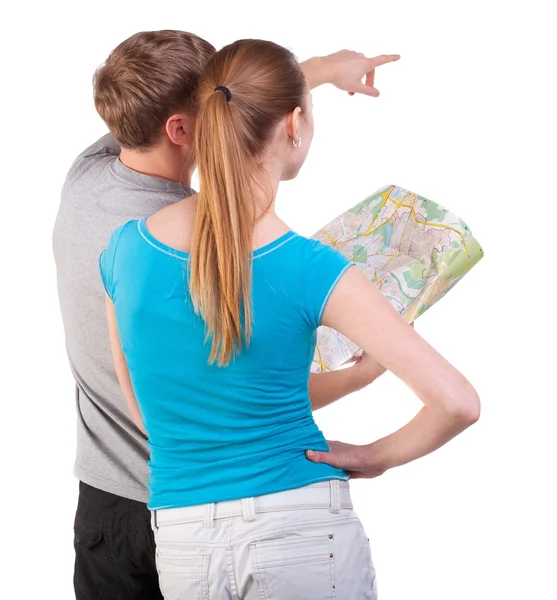 Viaje de vista trasera de la joven pareja mirando el mapa — Foto de Stock