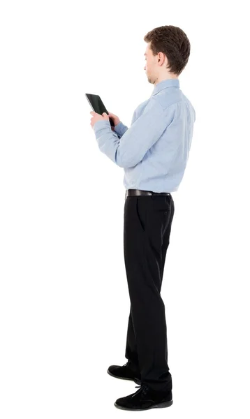 Back view of business man uses mobile phone. — Stok Foto