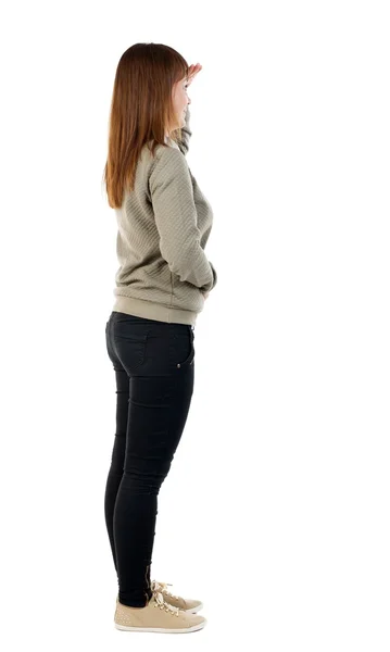 Sidovy av stående ung vacker kvinna. — Stockfoto