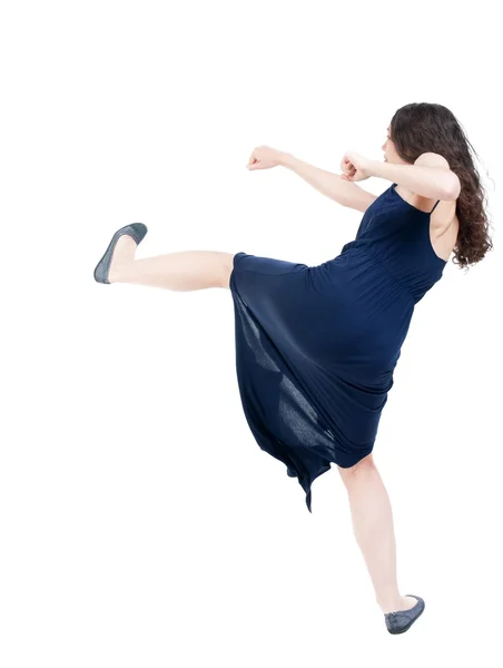 Mujer flacas gracioso combate agitando sus brazos y piernas. — Foto de Stock