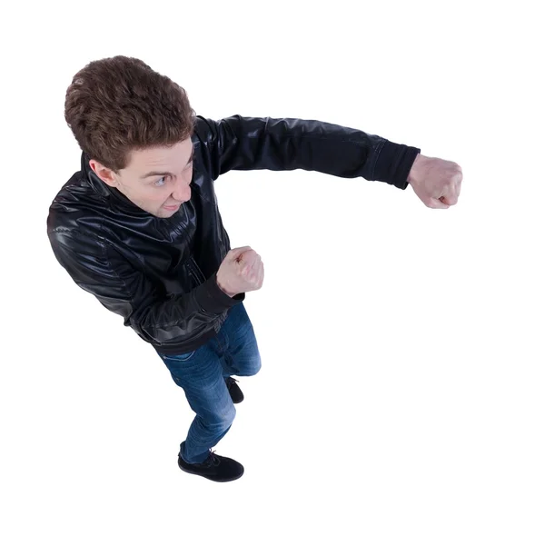 Skinny guy funny fights waving his arms and legs — Stock Photo, Image