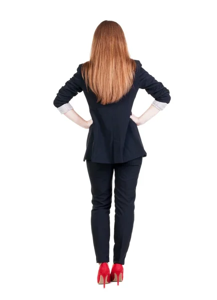 Vista de mulher de negócios ruiva contemplando traseira. — Fotografia de Stock