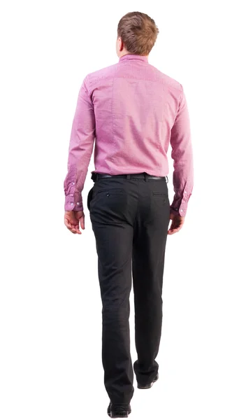 ハンサム ビジネス男ピンクの t シャツで行くの背面図 — ストック写真