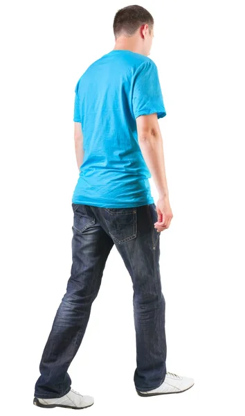 Back view of walking handsome man in t-shirt. — Stock Photo, Image