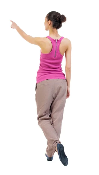 Back view of  pointing woman — Stock Photo, Image