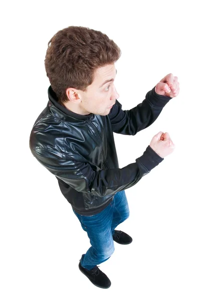 Skinny guy funny fights waving his arms and legs. — Stock Photo, Image