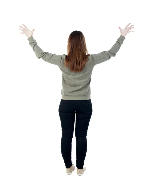 Back view of Beautiful woman looking at wall and Holds  hand up. — Stock Photo, Image