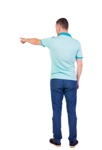 Achteraanzicht van jonge mannen in shirt en spijkerbroek te wijzen. — Stockfoto