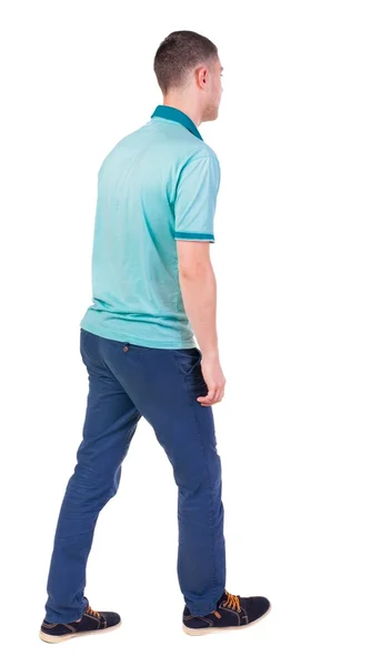 Вид сзади на красивого мужчину в джинсах и рубашке . — стоковое фото