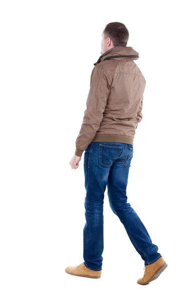 Back view of going  handsome man in brown wind breaker — Stock Photo, Image