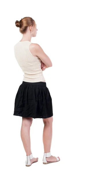 Back view of standing young blonde woman. —  Fotos de Stock