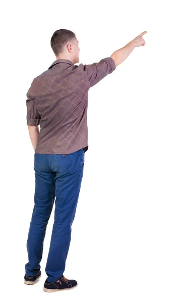 Vista posterior de hombres jóvenes señalando en camisa y jeans . — Foto de Stock