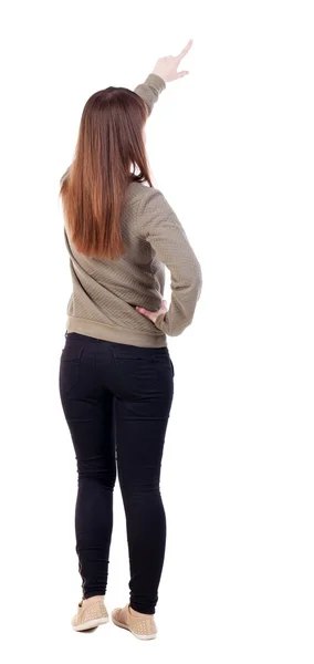 Vista posterior de la mujer que señala . —  Fotos de Stock