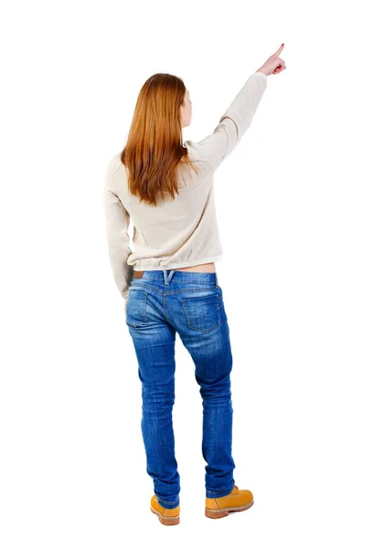 Back view of  pointing woman. beautiful girl. — Stock Photo, Image