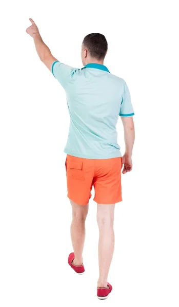 Back view of going  handsome man in shorts.  walking young guy — Stock Photo, Image