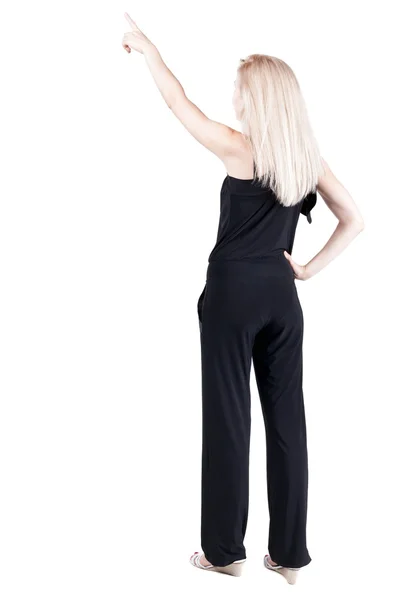 Back view of  pointing woman. beautiful blonde gir - Stock-foto